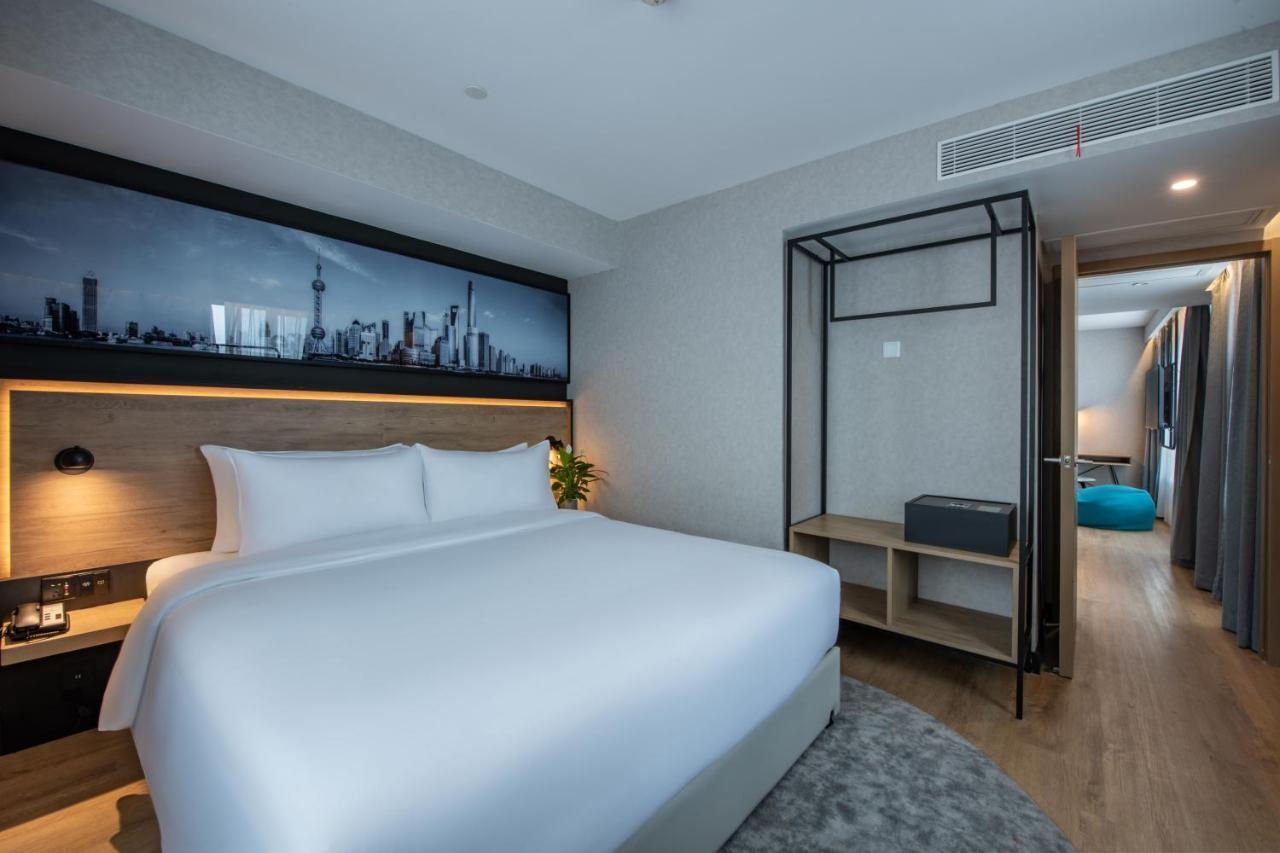 Park Inn By Radisson Shanghai Huanqiugang מראה חיצוני תמונה
