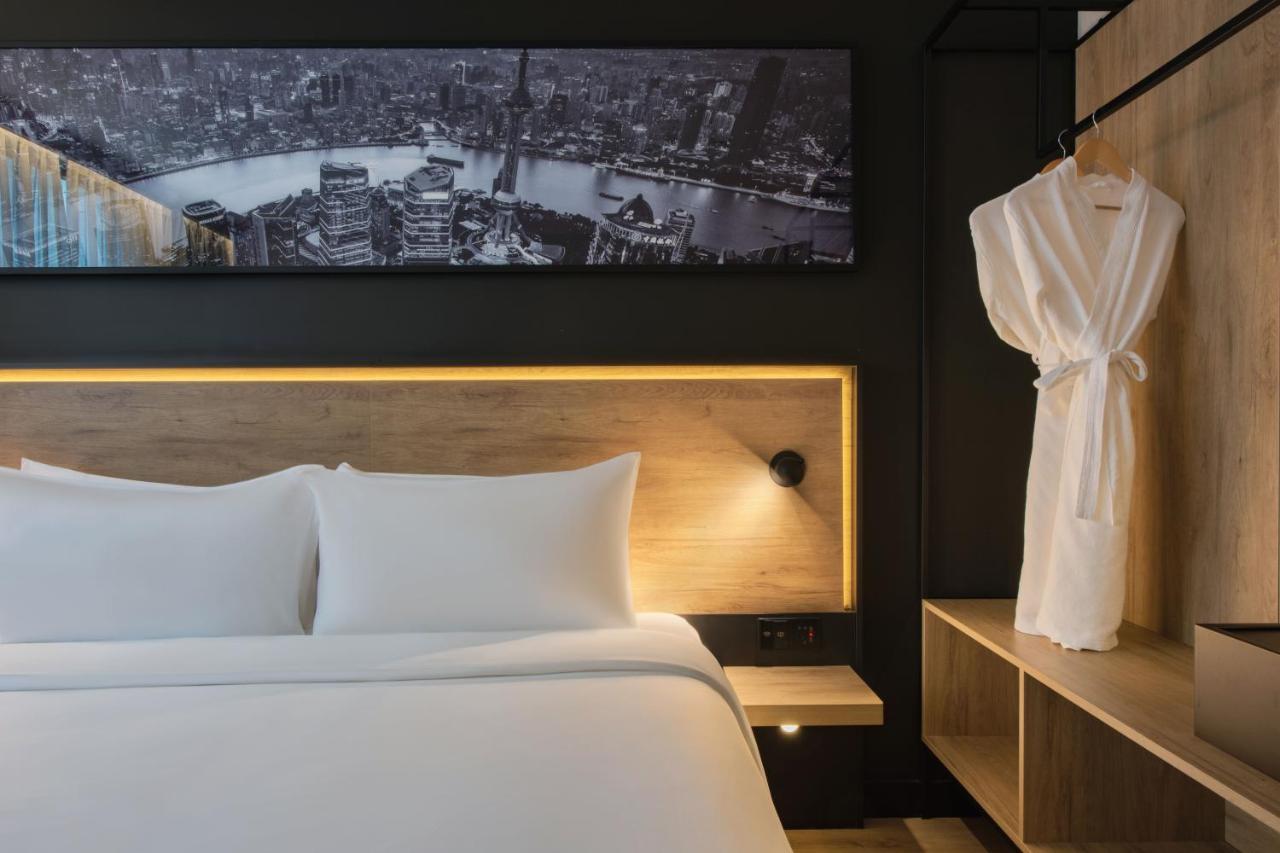 Park Inn By Radisson Shanghai Huanqiugang מראה חיצוני תמונה