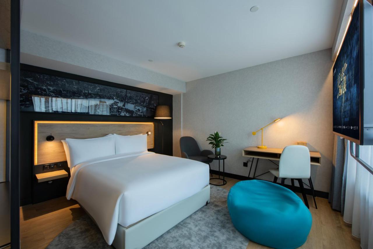 Park Inn By Radisson Shanghai Huanqiugang מראה חיצוני תמונה