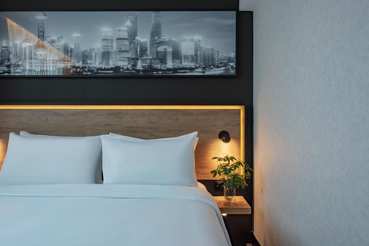Park Inn By Radisson Shanghai Huanqiugang מראה חיצוני תמונה