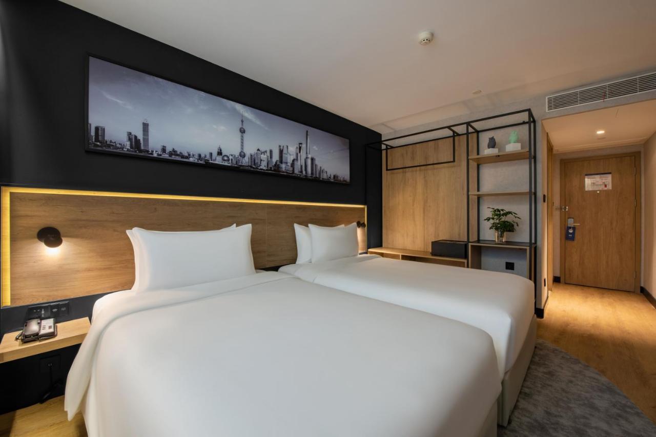 Park Inn By Radisson Shanghai Huanqiugang מראה חיצוני תמונה