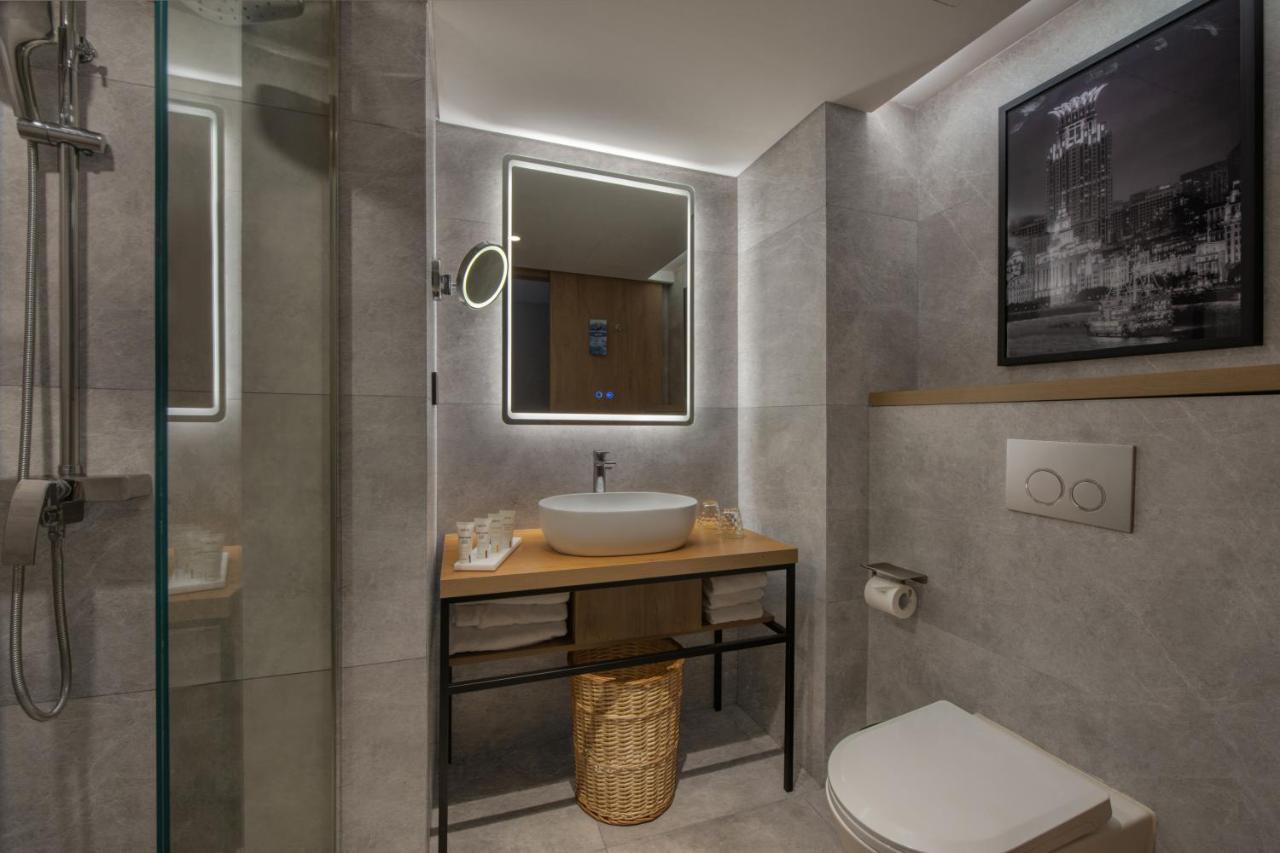 Park Inn By Radisson Shanghai Huanqiugang מראה חיצוני תמונה